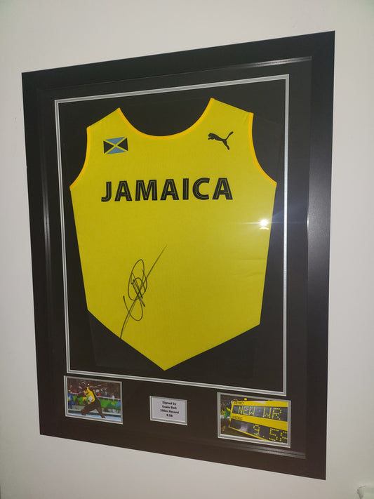 Usain Bolt signed Jamaica Framed Bib Shirt with COA