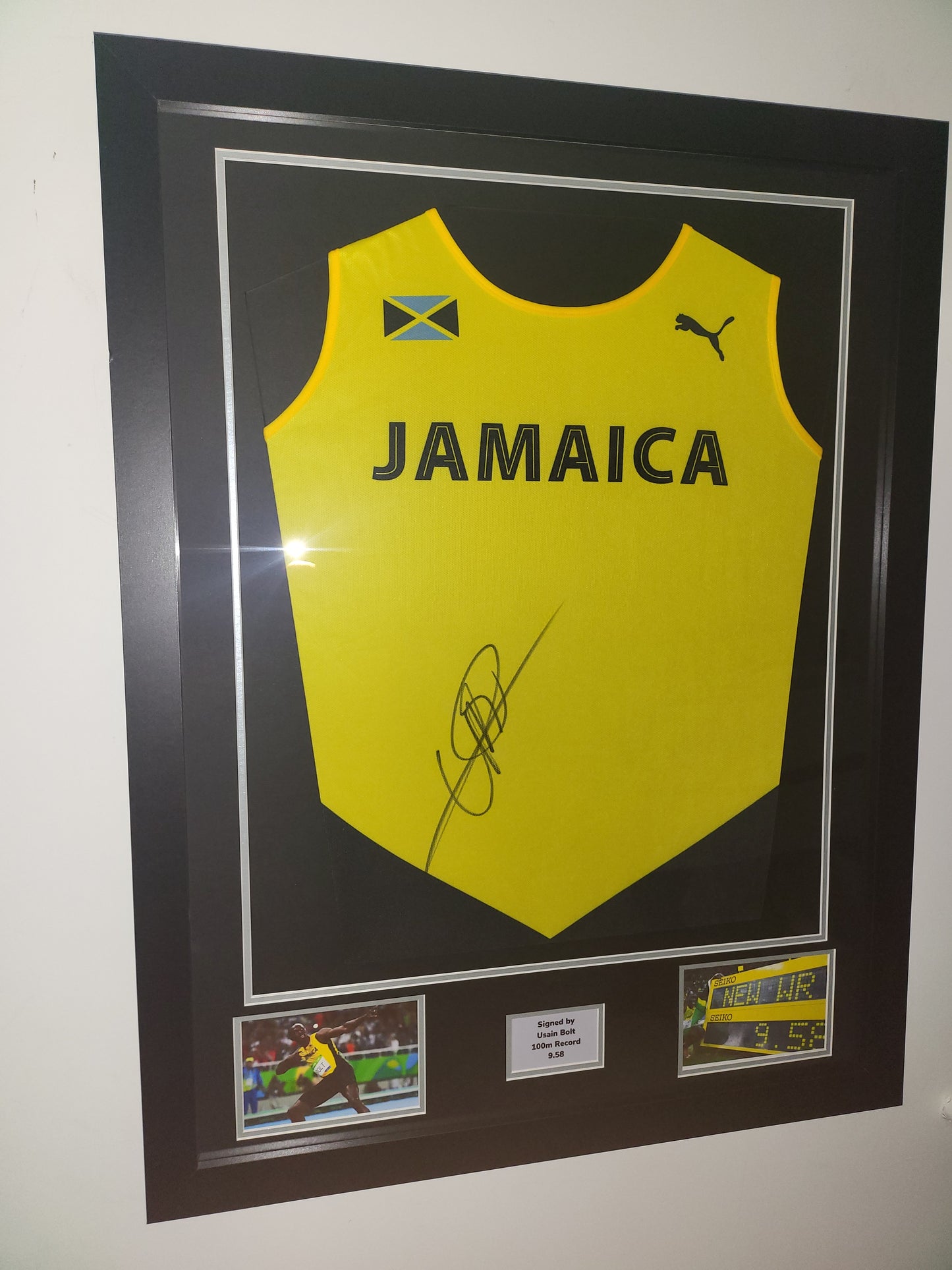 Usain Bolt signed Jamaica Framed Bib Shirt with COA